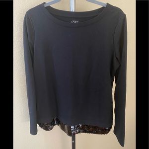 NWOT black top with sequence at the bottom.